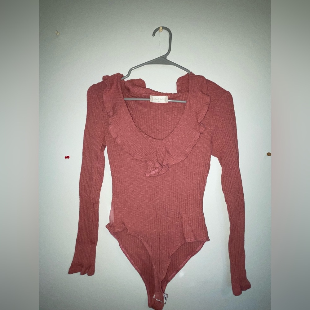 Altar’d Stare Ruffled Neck Body Suit
